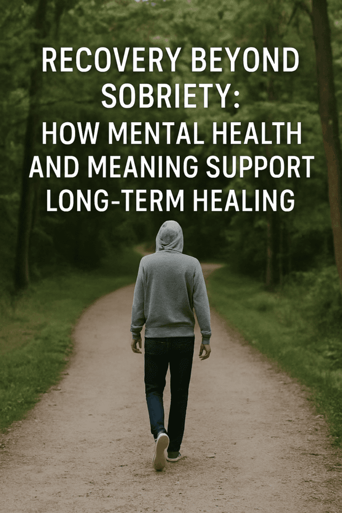 A person walks down a forest path, representing recovery beyond sobriety and the journey toward healing, purpose, and mental health.